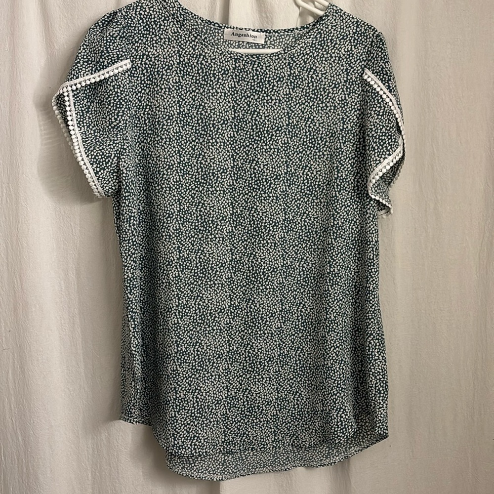 Pretty teal and white top.